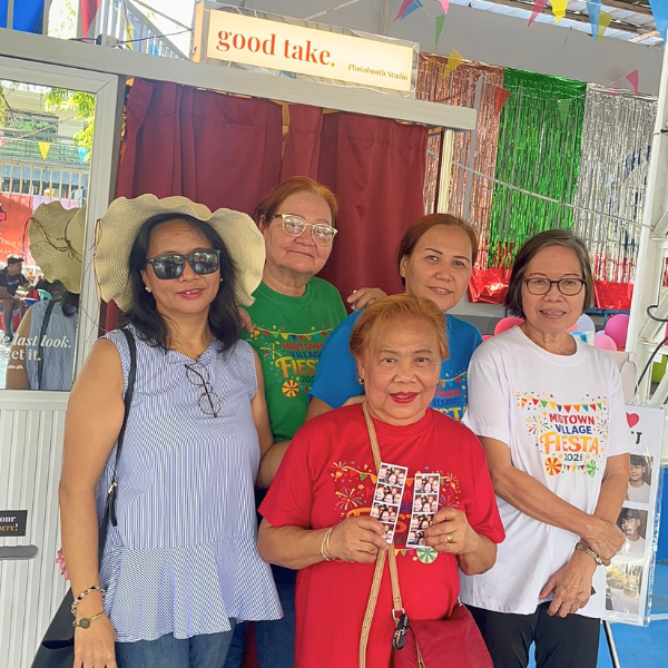 Group outside booth